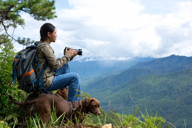 A woman with a camera World photographer day.