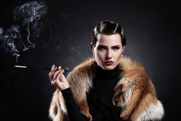 Woman with cigarette in vintage image