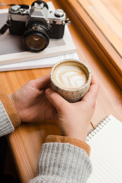 Free photo woman with a cup of coffee