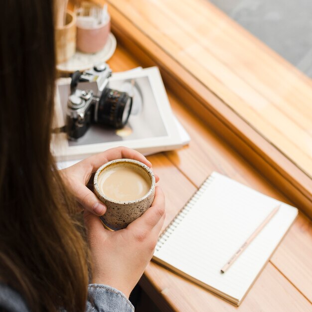 Woman with a cup of coffee