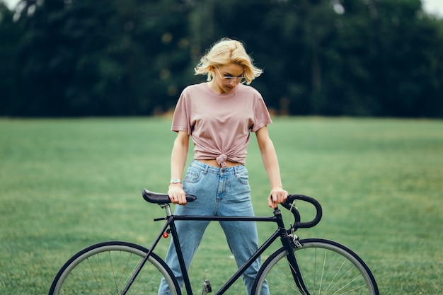 Free photo woman with cycling