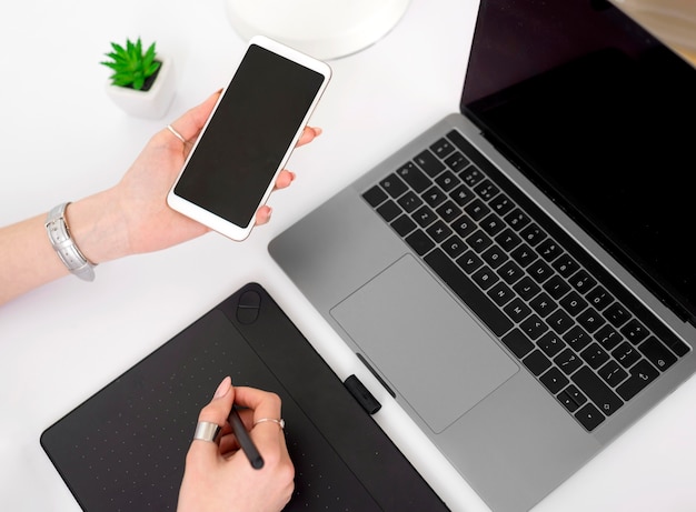 Woman with device working from home