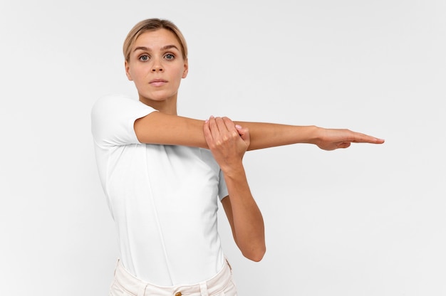 Woman with doing physiotherapy with arms