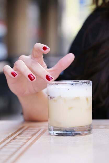 Woman with a drink