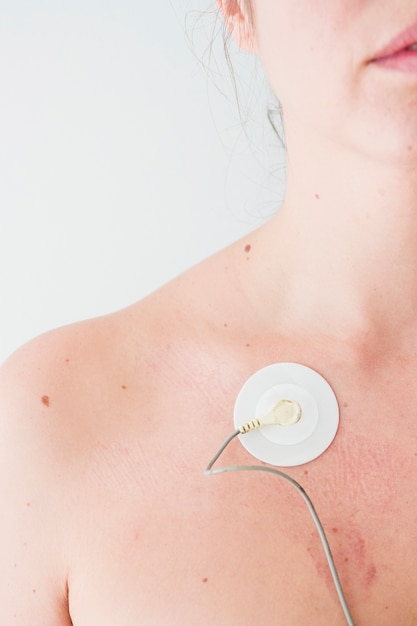 Free photo woman with electrode on body