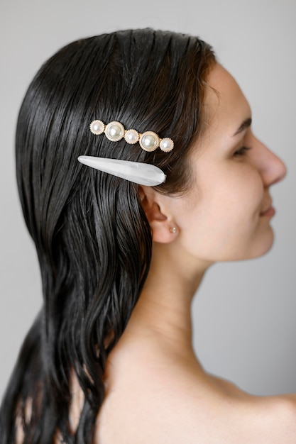 Free Photo woman with elegant clips in hair