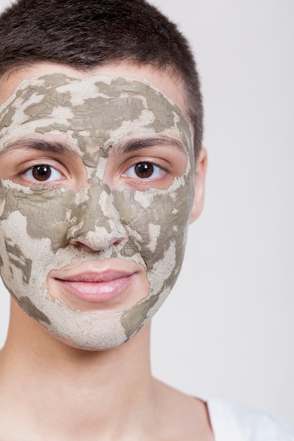 Woman with face mask looking at camera close-up