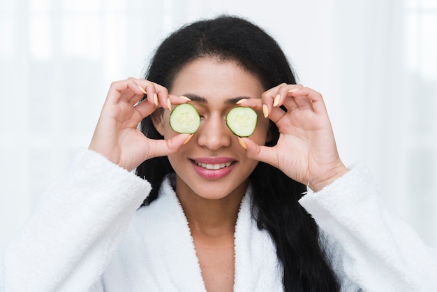 Free photo woman with a facial mask in a spa