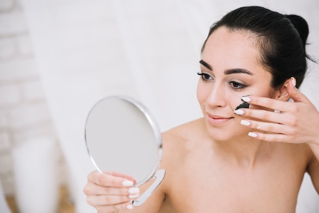 Woman with a facial treatment