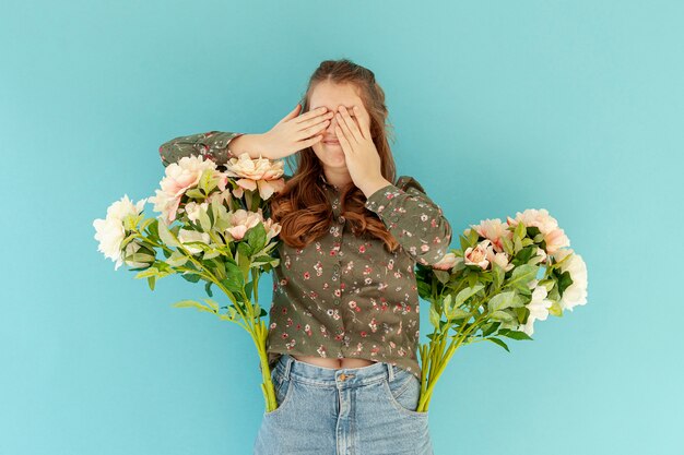 Woman with flowers in pocket