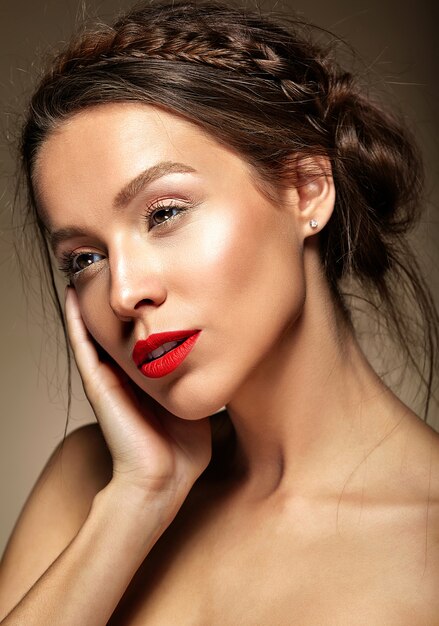 Woman with fresh daily makeup and red lips