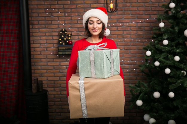 Free photo woman with gifts for christmas