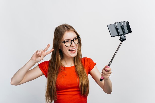 Woman with glasses taking a selfie