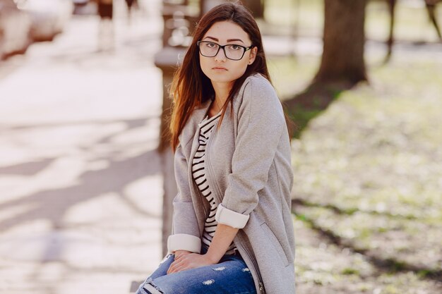 Woman with hands on legs