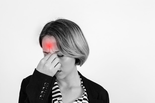 Woman with headache in studio