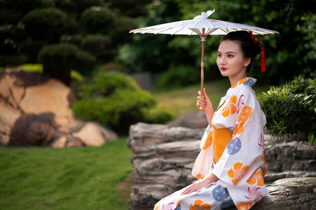 Woman with kimono and wagasa umbrella