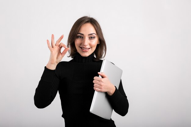 Woman with laptop isolated