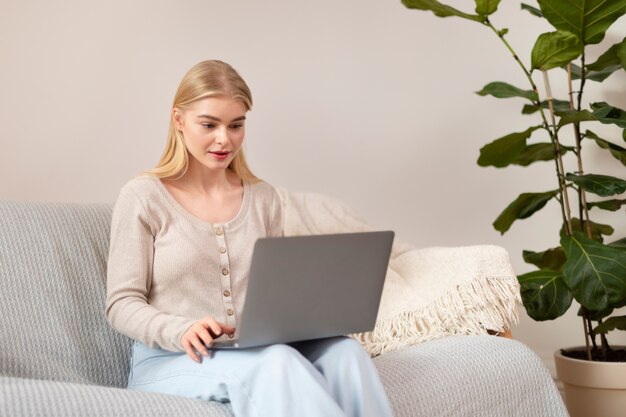 Woman with laptop medium shot