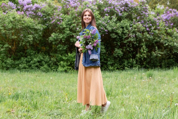 Woman with lilac bouquet