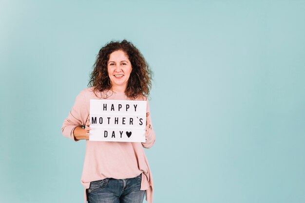 Woman with Mother's Day greetings