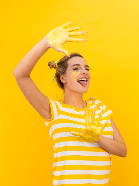 Woman with painted hands having fun