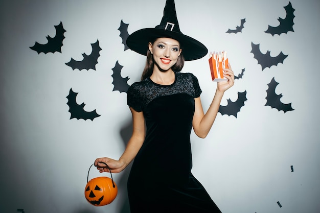 Woman with pumpkin and box