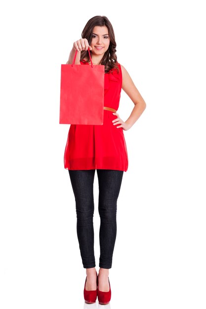 Woman with red shopping bag