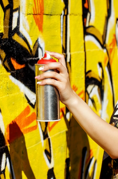 woman with spray can