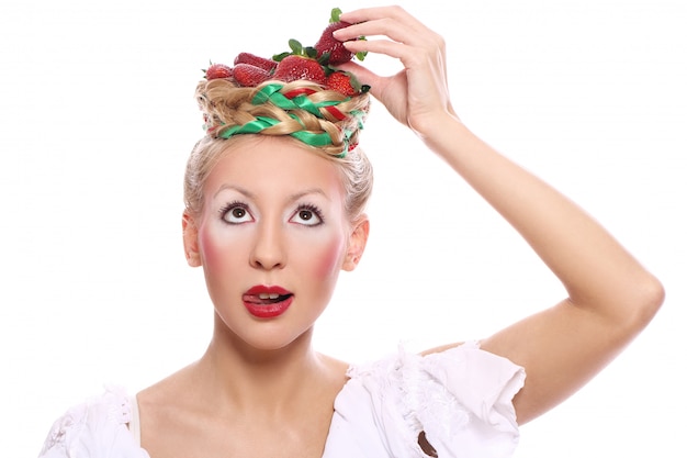 Free Photo woman with strawberry in her hairstyle