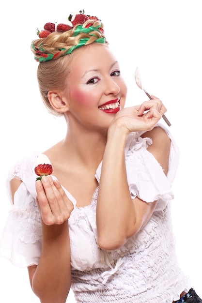 Woman with strawberry in her hairstyle