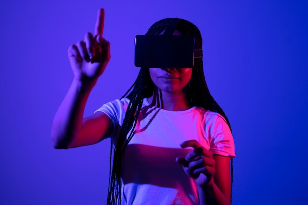 Woman with vr glasses medium shot