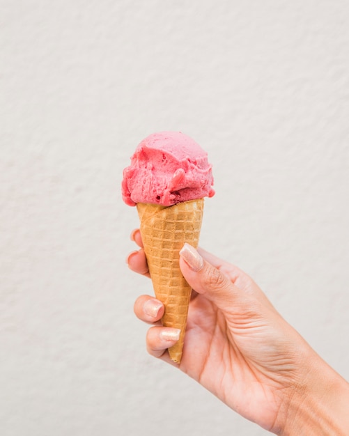 Woman with waffle cone of ice cream