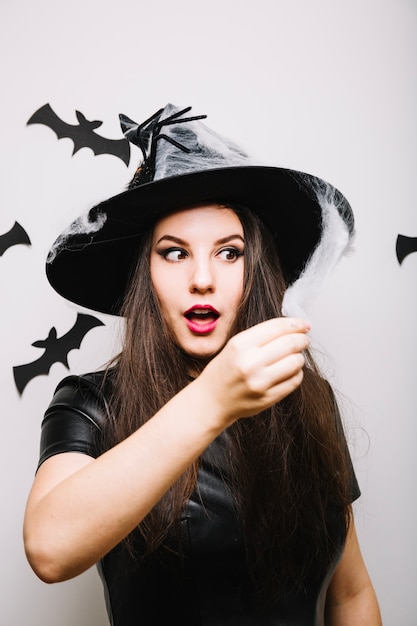 Woman with web on Halloween hat