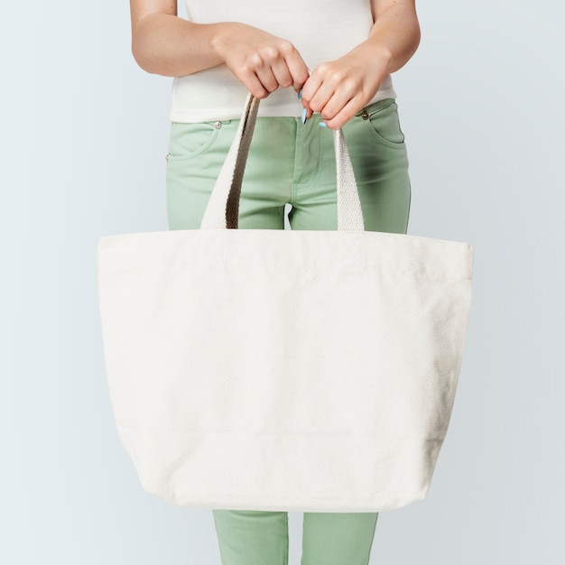 Woman with white tote bag