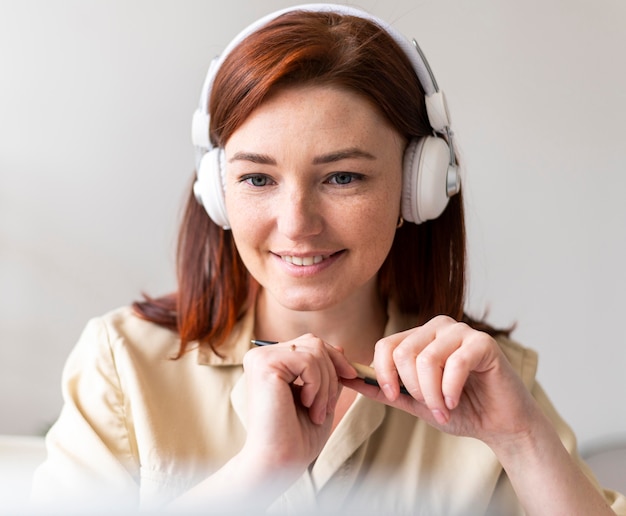 Woman at work having video call