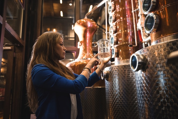 Woman working in beer factory