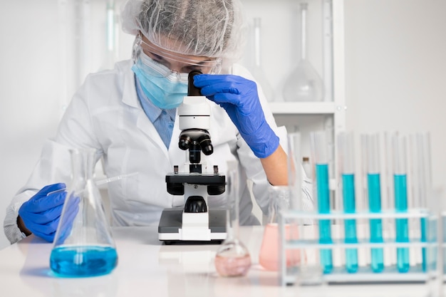 Woman working in laboratory close up