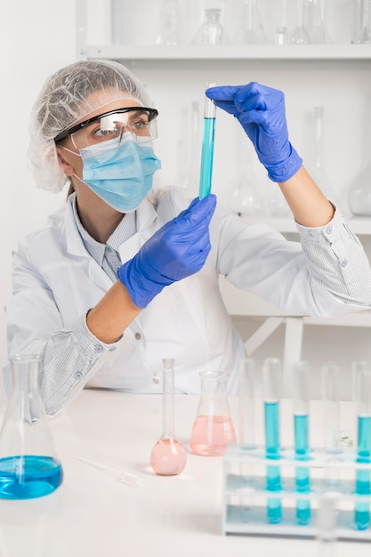 Woman working in laboratory close up