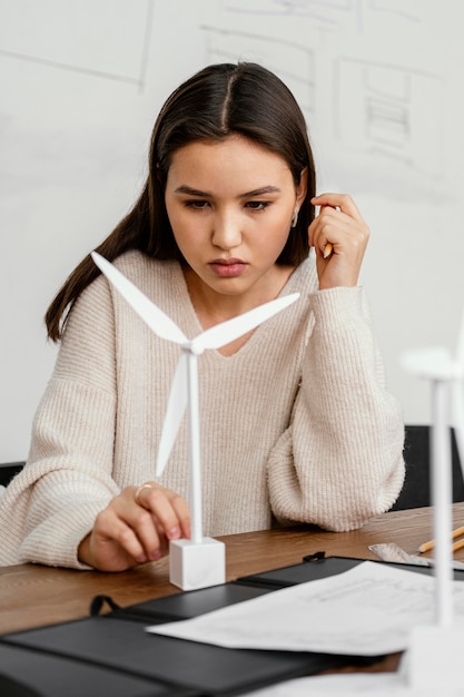 Woman working on renewable energy project