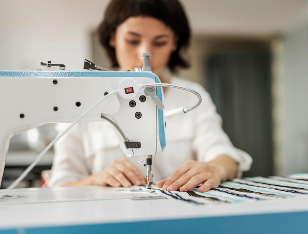 Woman working at sewing machine