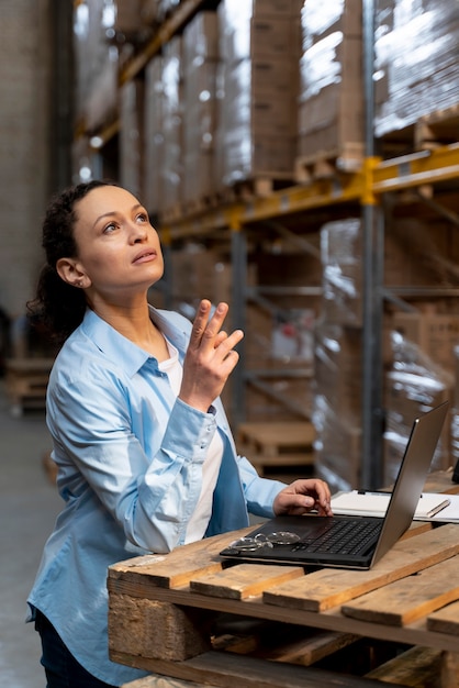 Free photo woman working in warehouse