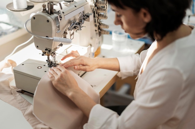 Woman working with sewing machine