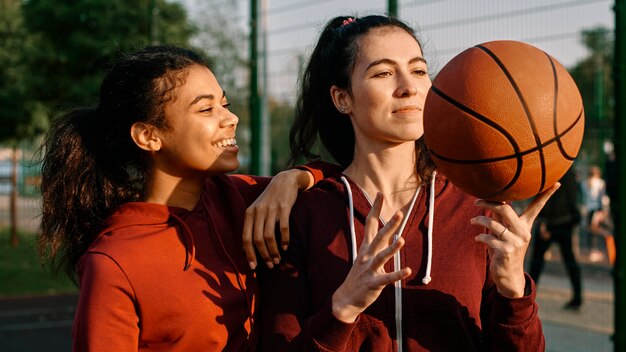 Women being happy after a basketball game