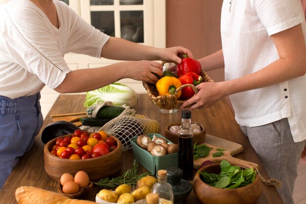 Women cooking with different ingredients