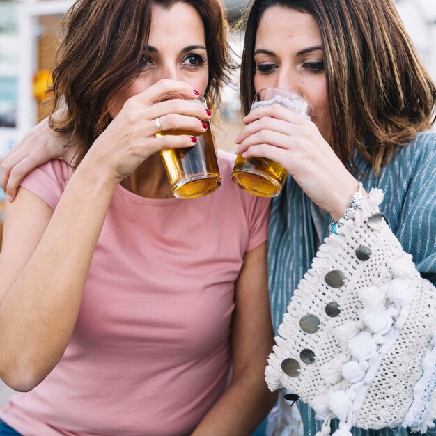 Women drinking beer together