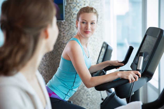 Free photo women on elliptical tape