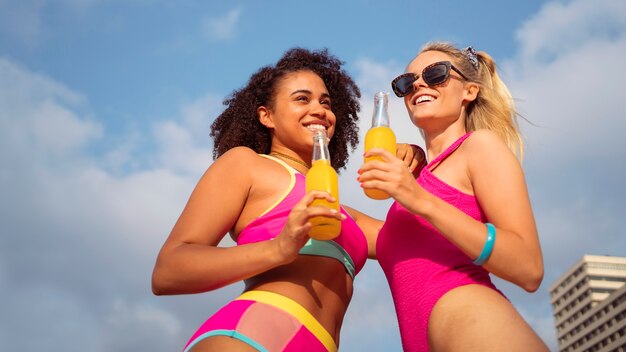 Women enjoying 80s summer aesthetics