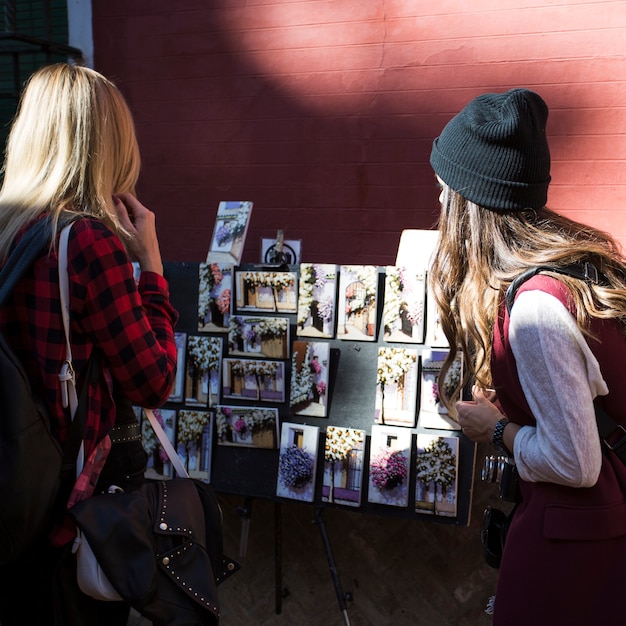 Women looking at postcards 