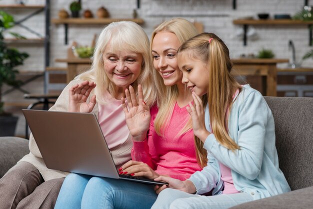 Women looking and talking on the laptop