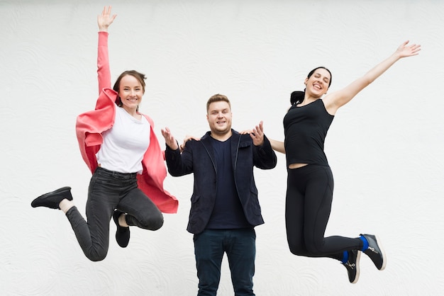 Free Photo women and man having fun on white background